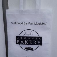 Reusable bag Joseph's Bakery packs your to go items in. at Joseph's Organic Bakery in Miami