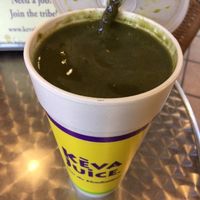 Holy Kale veggie smoothie: almond milk, kale, banana, strawberry, and honey. It's very good. at Keva Juice in Las Cruces