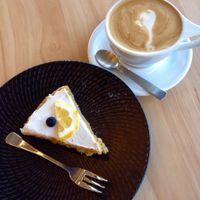 Lemon cake and coconut milk coffee at The Origin in Christchurch