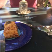 Baklava and Turkish coffee in the background  at Pasha Turkish & Arabic Cuisine in Tulum