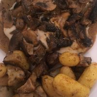 Seitan with mushrooms, potatoes, and Jerusalem artichokes  at Un'Altra Idea in Bologna