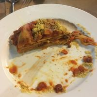 Half eaten lasagna 😋 at La Pasta in Siem Reap