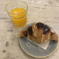 Vegan chocolate croissant and orange juice  at Pappare' in Bologna