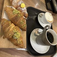 brioche con crema, brioche con pistacchio e matcha, cappuccino di soia, caffè americano   at Pappare' in Bologna