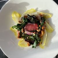 Macadamia mozzarella, pickled beetroot, witlof, hazelnut, red wine dressing  at Cafe Sydney in Sydney