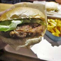 Burger with rösti, spinach and mustard at Season Square in Paris