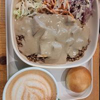 Quinoa with tofu and mushroom sauce, bread at Season Square in Paris
