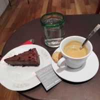 Chocamole raw chocolate vegan cake and decaf double espresso. Both of great quality! at Melikrini in Athens