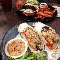 Wraps de tofu y mantequilla de cacahuete y la hamburguesa de la semana con beyond burguer, muchísimo aguacate y crema de queso casero de anacardos. at Veganerie - Ratchathewi in Bangkok