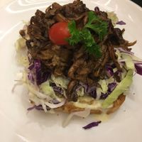 Sandwich with pulled vegan BBQ pork and coleslaw at Veganerie - Ratchathewi in Bangkok