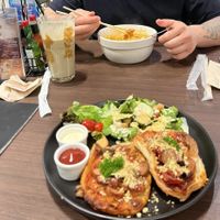 Bottom: pizza set, top: protein shake and khao soi  at Veganerie - Siam Paragon in Bangkok