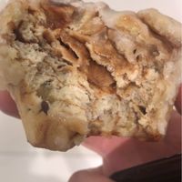 Half eaten cinnamon bun - delicious  at Veganerie - Ratchathewi in Bangkok