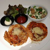 pizzas with cesar salad at Veganerie - Ratchathewi in Bangkok