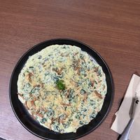 Red lentil pasta with cashew cheese sauce and nutritional yeast (25g protein)  at Veganerie - Ratchathewi in Bangkok