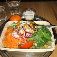 Salad bowl with vegan cheese, rice and guacamole. at Ahimsa The Vegan Cafe in North West London