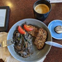 Yummyyy creamy mushrooms with super seed loaf toast! Very tasty and filling. Great way to start the day with an oat flat white and a bounty bar slice 😌 at Two Spoons in Whangaparaoa
