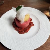 Dessert, strawberry, goji berry, pecan, with a rum reduction, topped with cotton candy at Avelo in Toronto