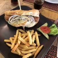 Good hot dog, 2 sausages in it. The sausage has a smoky taste. Great bun and comes with fries  at Vegan Heaven in Chiang Mai