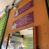 Sink near seating and quotes  at Vegan Heaven in Chiang Mai