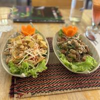 Crispy chicken salad and papaya salad. Delicious!  at Vegan Heaven in Chiang Mai