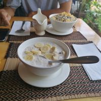 Porridge and fruit salad with muesli (a bit dry) , both with a choice of coconut or soy milk at Vegan Heaven in Chiang Mai