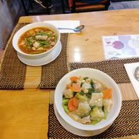 Rard-na soup (sooo interesting, try it!) and tom yum soup at Vegan Heaven in Chiang Mai