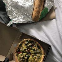 Vegan pizza and garlic bread at Hell Pizza in Taupo