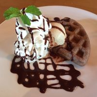waffle, vanilla ice cream, chocolate sauce, and coconut whipped cream (all vegan) at Sayuri Healing Food in Ubud