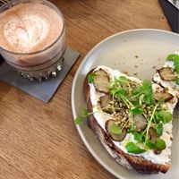 Hot chocolate and toast with almond feta. All vegan! at Mok in Brussels