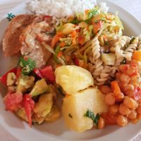 Some soy protein, avocado/tomato salad, potatoes, rice, chickpea curry, pasta and a tasty apple salad at Eurasia Restaurante Vegetariano in Albufeira