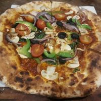 Veggie pizza without cheese at Adirak in Chiang Mai