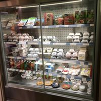 Display case with the cheeses! at Jay & Joy in Paris