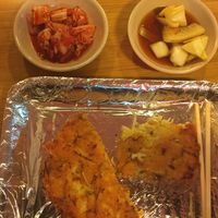 Pancake, (questionable) kimchi, and onions  at Soonheene Bindaeddeok - 순희네 빈대떡 in Seoul