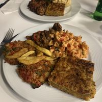 Manti + zucchini cake + vegetable patty and fries + seitan  at Vegan Istanbul in Istanbul