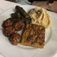 Hummus + zucchini cake + falafel + wine leaves stuffed at Vegan Istanbul in Istanbul