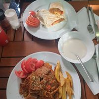 Seitan kebab (on a plate) and Seitan kebab (wrap). Light yogurt sauce  at Vegan Istanbul in Istanbul