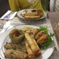 Mercimek (top right), Hommus (top middle), stuffed capsicum/Pepper/dolma (top left), good tofu (bottom left) and amazing cigarette börek (filled with vegan feta cheese! Sooo good!  at Vegan Istanbul in Istanbul