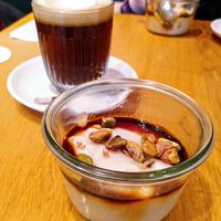 Flat white (almond milk) + Mouhalabieh at Judy in Paris