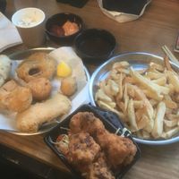 Battered sausage, mushy peas fritter, jack fruit balls, tofish and cauliflower  at Matter Fastfoods in Bristol
