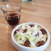 Make your own porridge: pomme, coconut flakes et noix de pécan at BOL Porridge Bar in Paris
