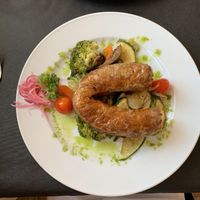 Vegan sausage plate  at Metamorphosis in Sintra