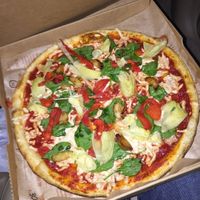 Regular crust, red sauce, vegan cheese, artichokes, roasted garlic, spinach, & roasted red peppers at Blaze Pizza in Webster