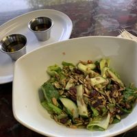 Side salad with apple cider vinegar + oil at Sanctuary Vegan Cafe in Knoxville