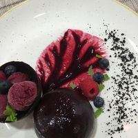 The chocolate sphere dessert with rasberry&mint sorbet  at Alive in Vilnius