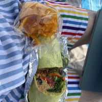 Hummus wrap and plantain chips. Super yummy and fresh!  at Tiki Fresh Food in Puerto Penasco