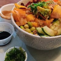 Brown rice 🍚 edamame 🫛 mango 🥭 avocado 🥑 cucumber 🥒 carrots 🥕 beetroot, sweet potato chips 🍠 seawead, Thai peanut 🥜 butter dressing at Tiki Fresh Food in Puerto Penasco