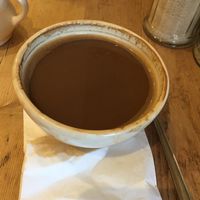 Shallow bowls spilling coffee no room for milk at Le Pain Quotidien - Westfield in London