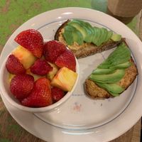 Avocado toast with fruit! They give you a ton of fresh fruit i loveee it  at Be Well Bakery & Cafe in Huntingdon Valley
