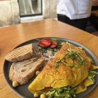 Vegan omelette with chickpeas, hummus, bbq sauce and smoked tofu.   at Coffee&Cake in Zadar