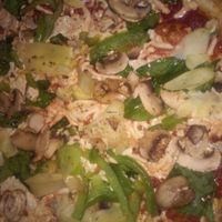 Build your own pizza with mushrooms, bell peppers, artichoke, and spinach  at Blaze Pizza in Eastvale